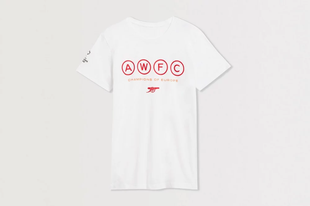 Arsenal Fanshop Store - Arsenal UWCL Champions Kinder-T-Shirt Offizielle Arsenal FC Fußballbekleidung