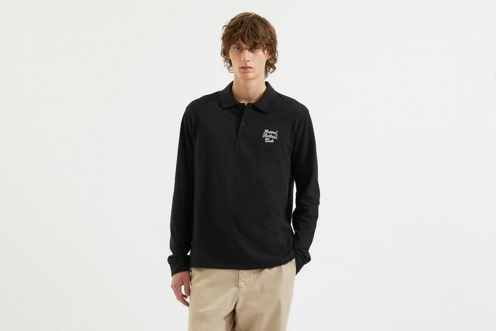 Arsenal Fanshop Store - Arsenal Essentials Schwarzes Poloshirt mit Schlitz und langen Ärmeln Offizielle Arsenal FC Fußballbekleidung