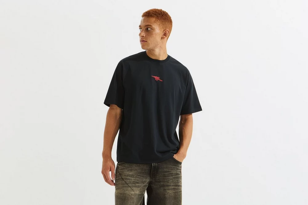 Arsenal Fanshop Store - Arsenal-Kanonen-T-Shirt in Marineblau Offizielle Arsenal FC Fußballbekleidung