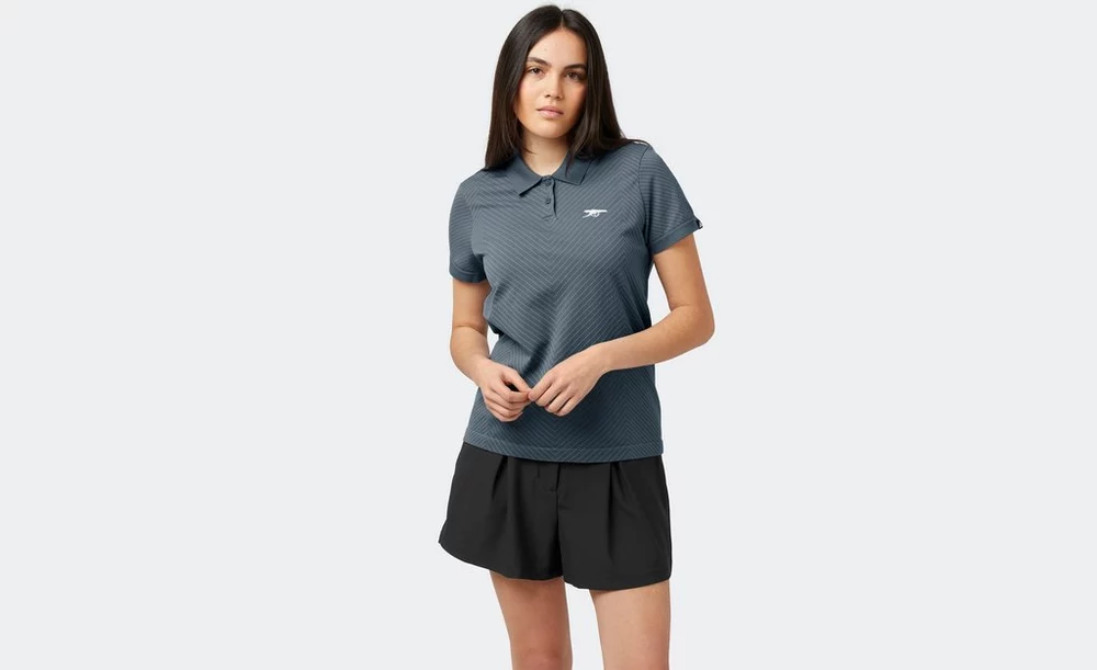 Arsenal Fanshop Store - Arsenal adidas Damen Golf Tour Blaues PRIMEKNIT Poloshirt Offizielle Arsenal FC Fußballbekleidung