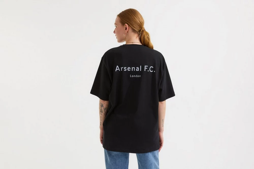 Arsenal Fanshop Store - Arsenal Damen Essentials Schwarzes Chapman T-Shirt Offizielle Arsenal FC Fußballbekleidung